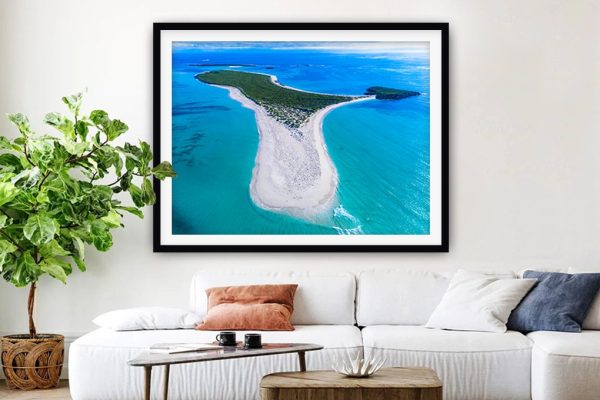 Boullanger Island by Matt Day, birds-eye island scene with reef patterns and blue water Boullanger Island by Matt Day, birds-eye island scene with reef patterns and blue water